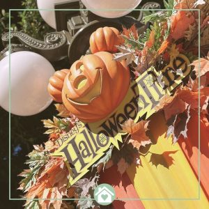 Disney Halloween decorations with pumpkin and fall leaves — inspiration for DIY Disney Halloween costumes.